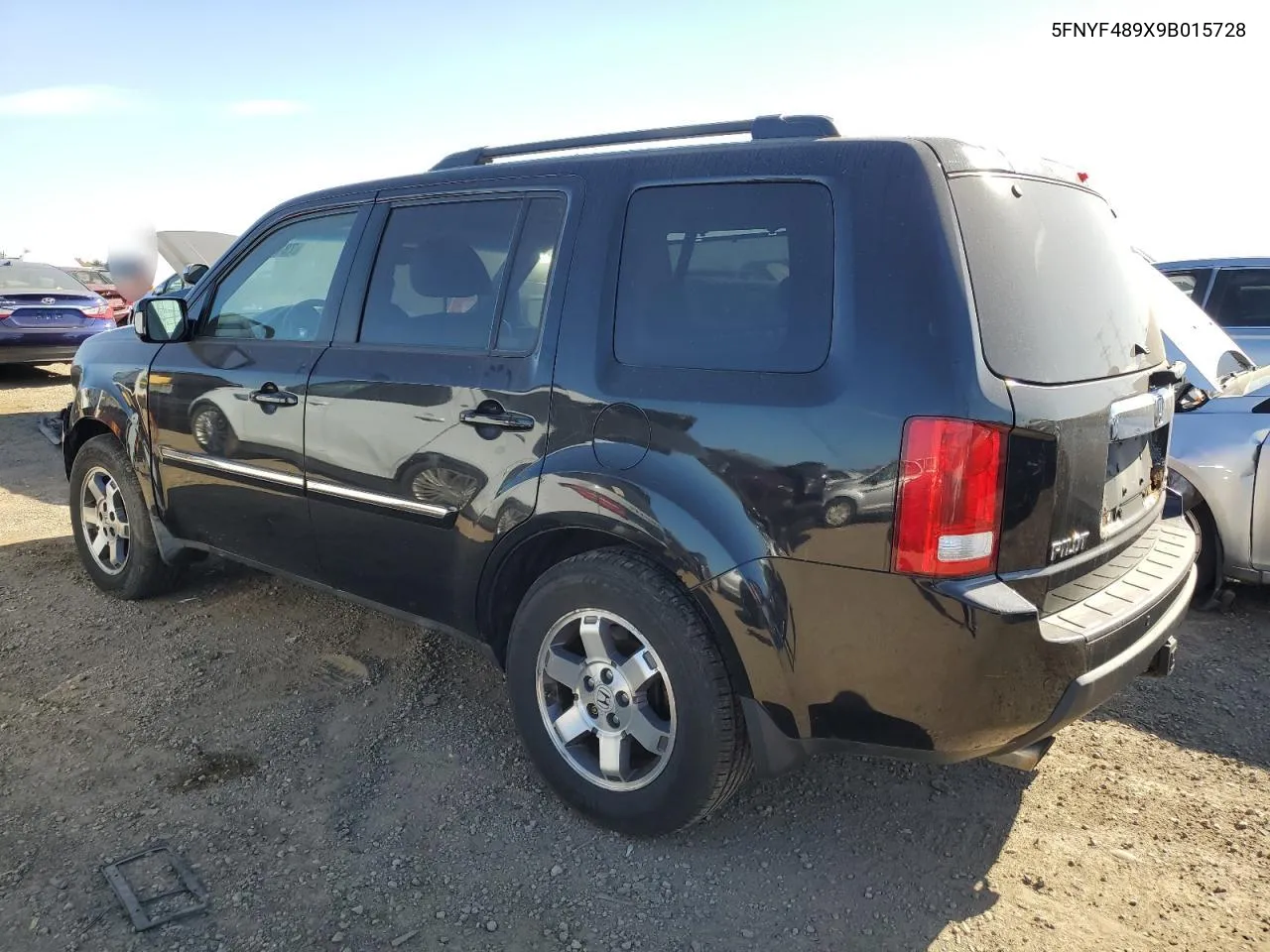 2009 Honda Pilot Touring VIN: 5FNYF489X9B015728 Lot: 73102354