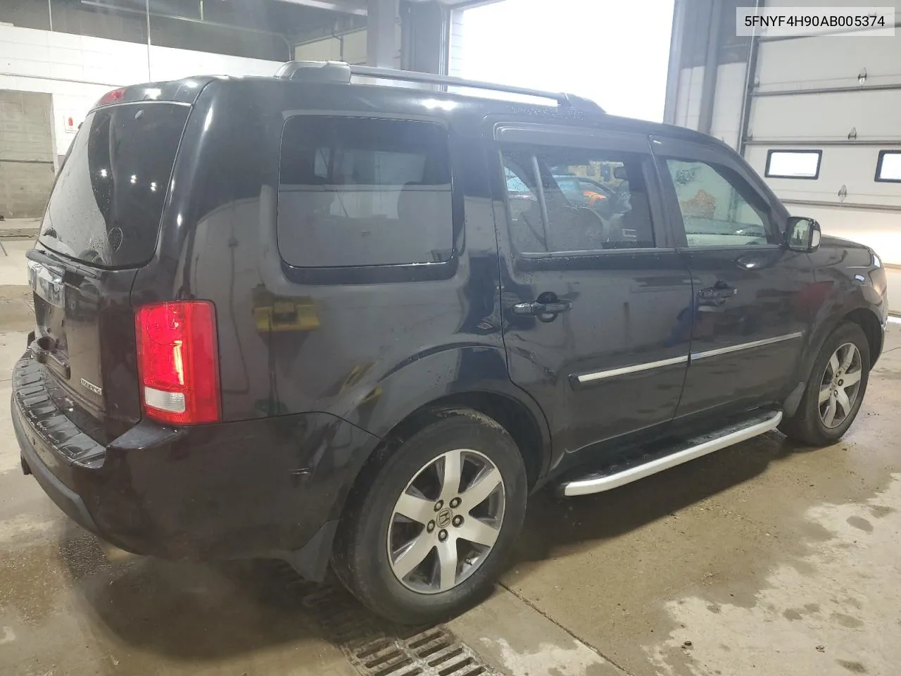 2010 Honda Pilot Touring VIN: 5FNYF4H90AB005374 Lot: 65993974