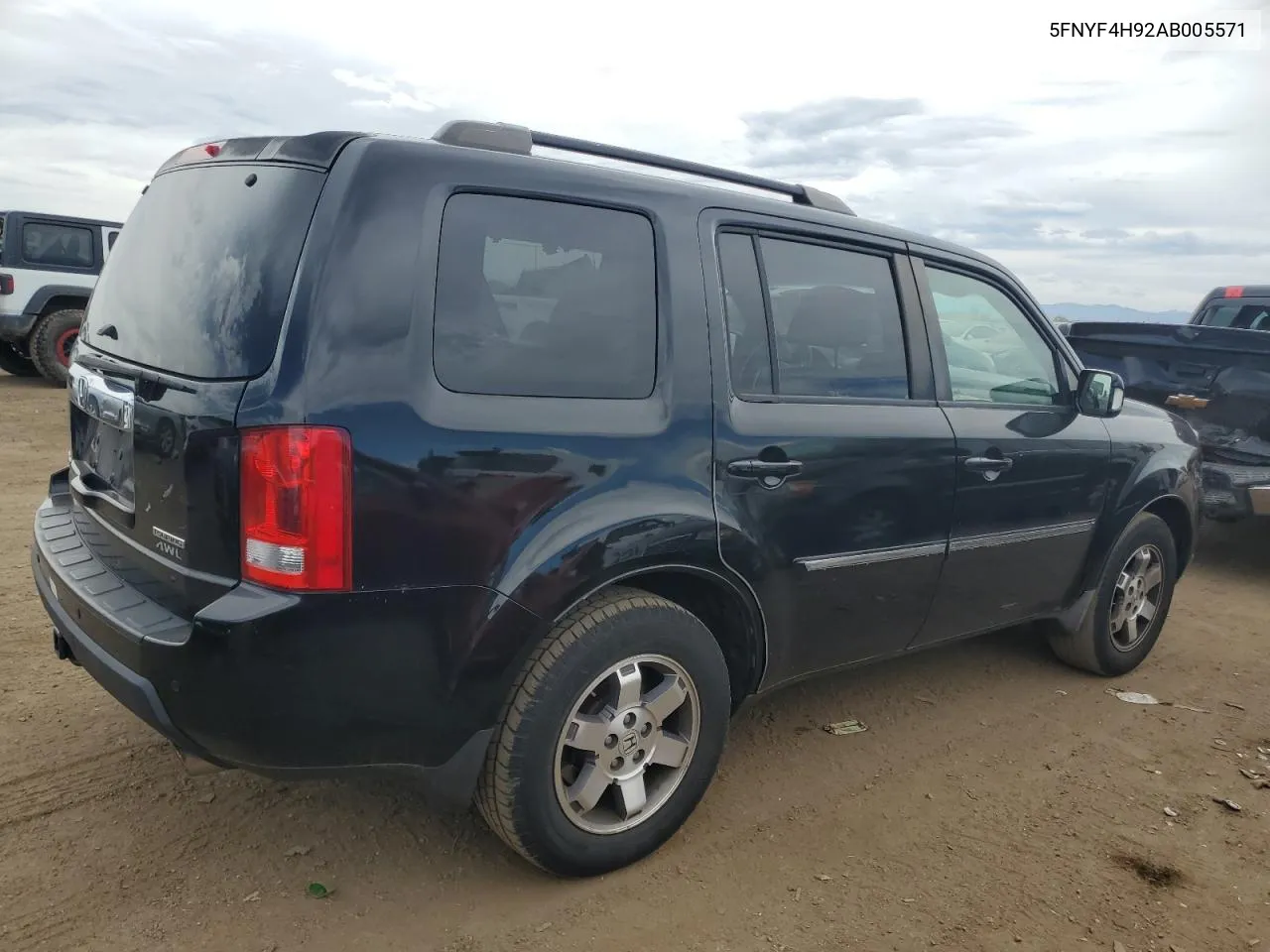 2010 Honda Pilot Touring VIN: 5FNYF4H92AB005571 Lot: 67279534