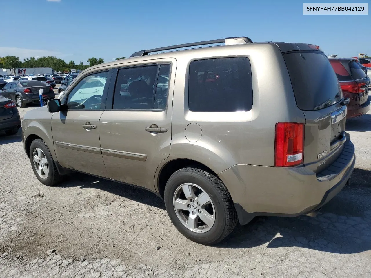 2011 Honda Pilot Exln VIN: 5FNYF4H77BB042129 Lot: 69640904