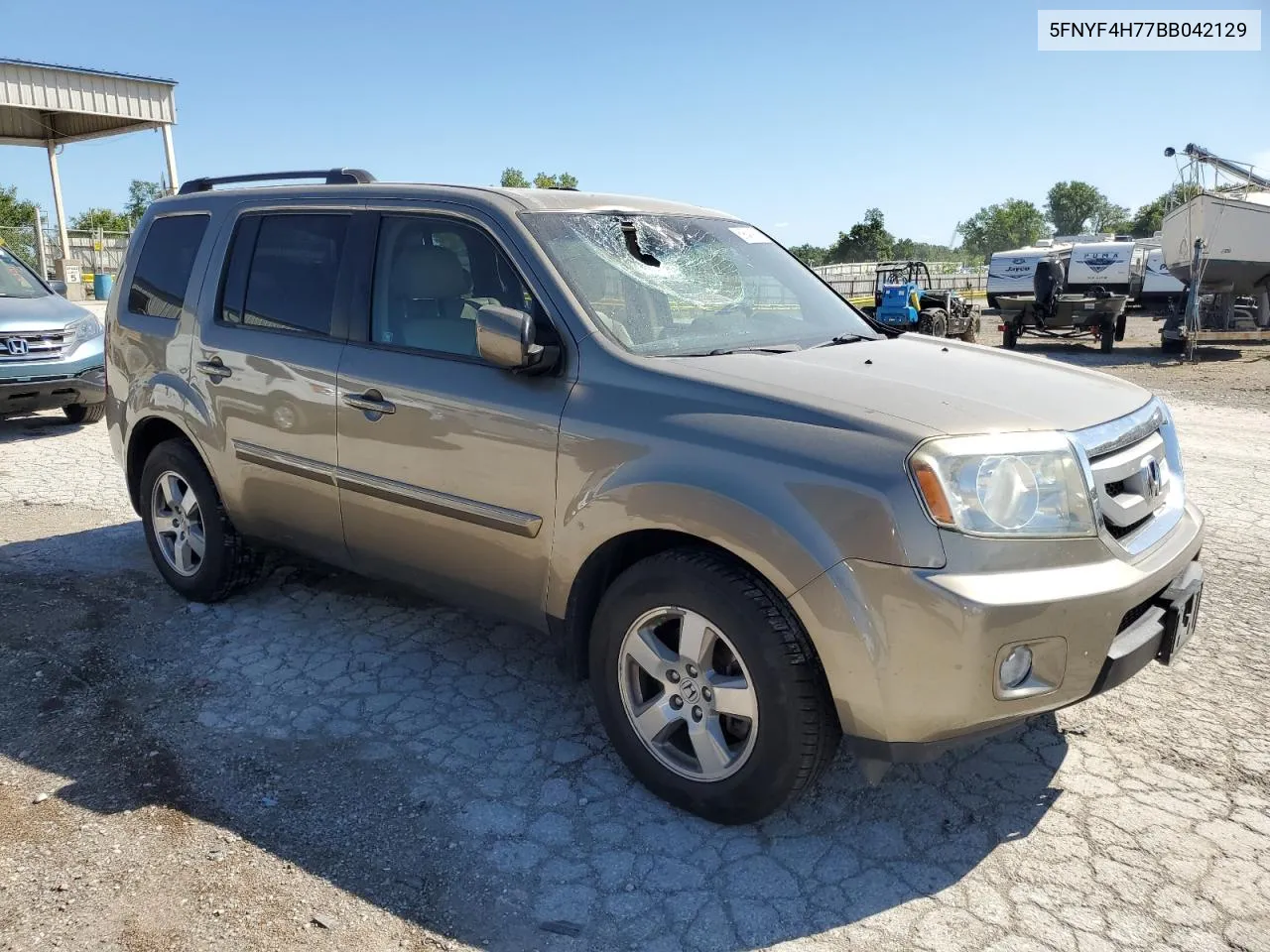 2011 Honda Pilot Exln VIN: 5FNYF4H77BB042129 Lot: 69640904