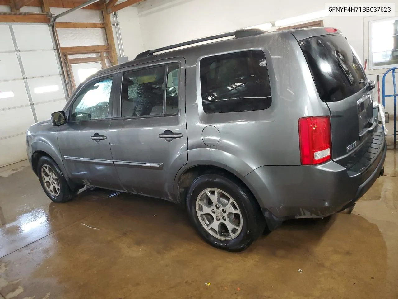 2011 Honda Pilot Exln VIN: 5FNYF4H71BB037623 Lot: 71056414