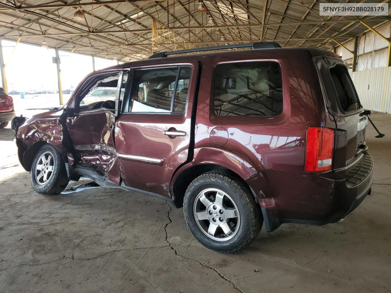 2011 Honda Pilot Touring VIN: 5FNYF3H92BB028179 Lot: 73349614