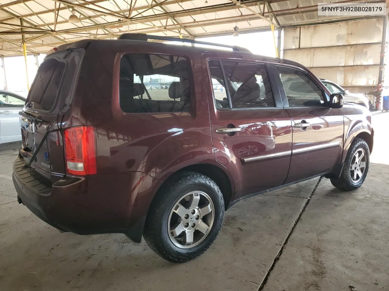 2011 Honda Pilot Touring VIN: 5FNYF3H92BB028179 Lot: 73349614