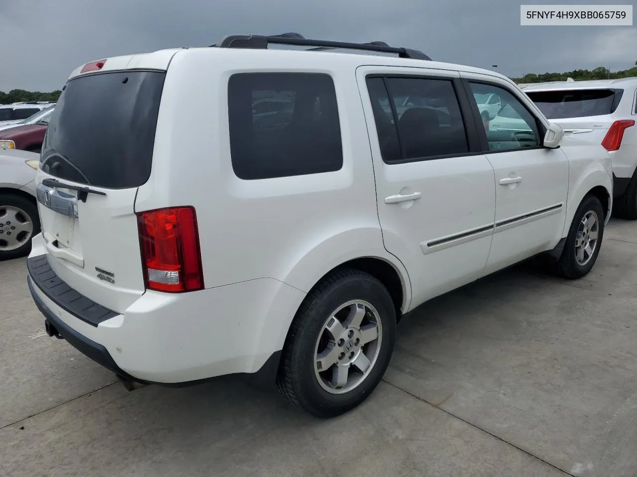 2011 Honda Pilot Touring VIN: 5FNYF4H9XBB065759 Lot: 74624704