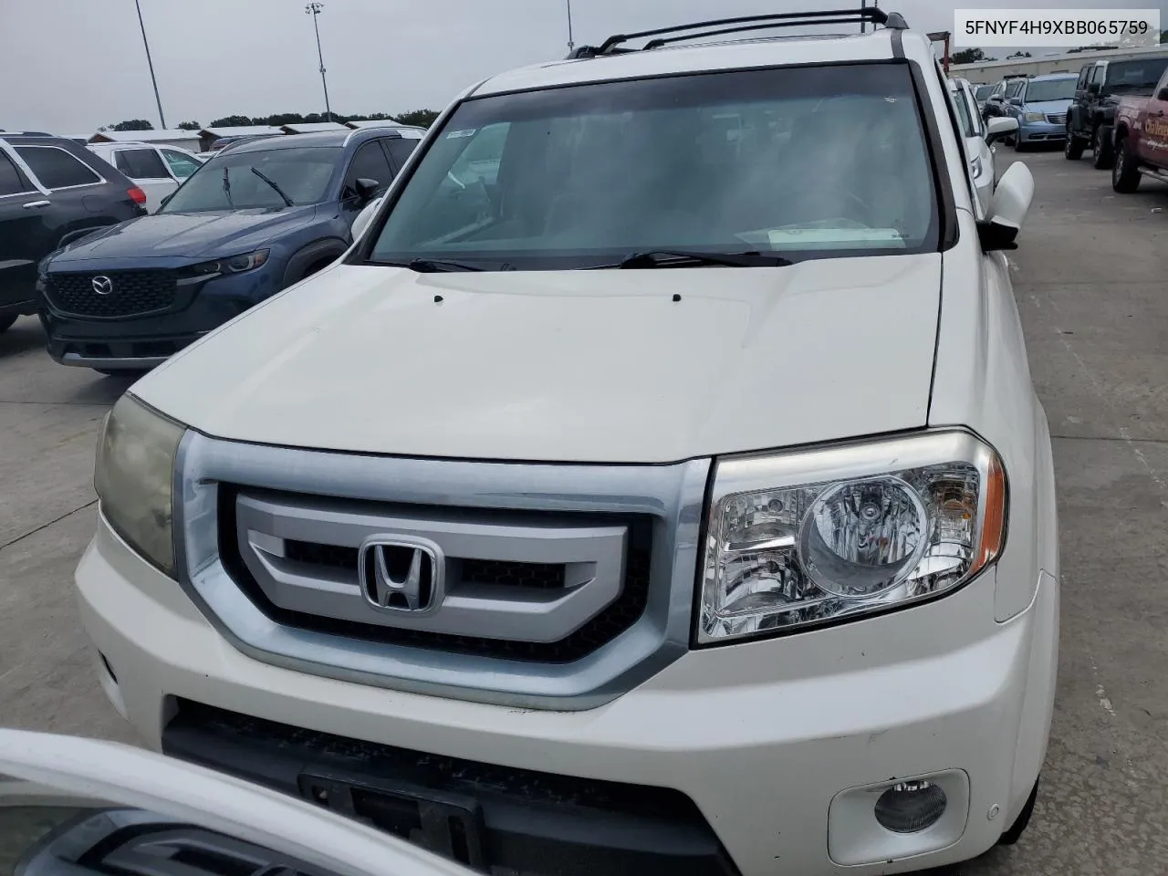 2011 Honda Pilot Touring VIN: 5FNYF4H9XBB065759 Lot: 74624704