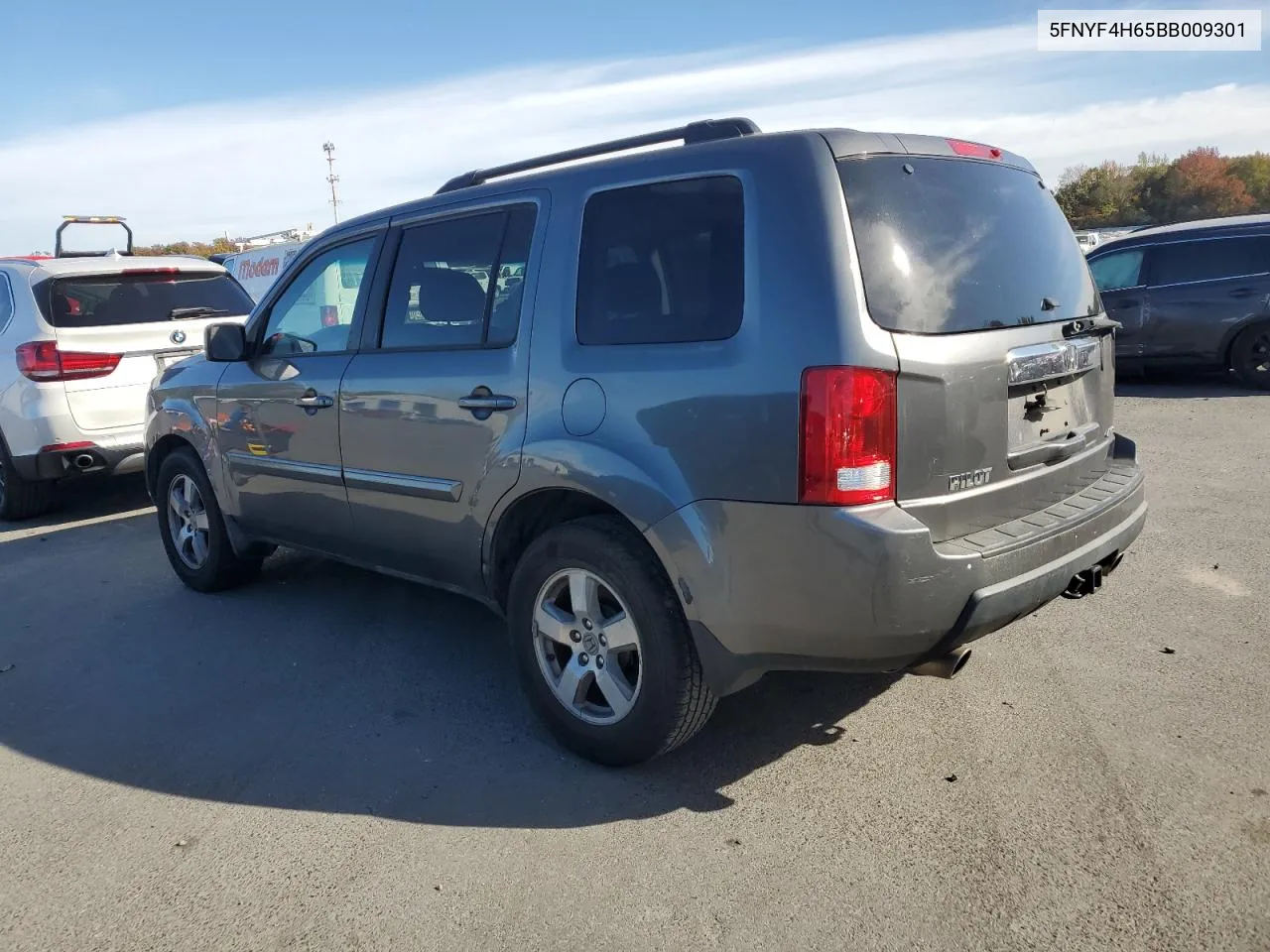 2011 Honda Pilot Exl VIN: 5FNYF4H65BB009301 Lot: 74823654