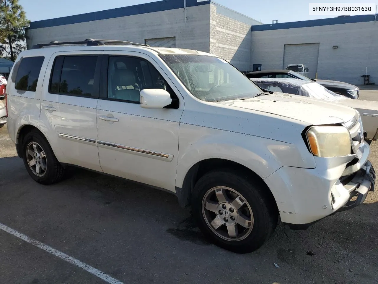 2011 Honda Pilot Touring VIN: 5FNYF3H97BB031630 Lot: 75690894