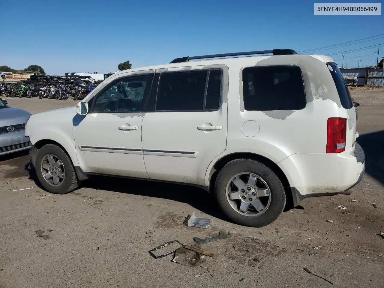 2011 Honda Pilot Touring VIN: 5FNYF4H94BB066499 Lot: 76501354