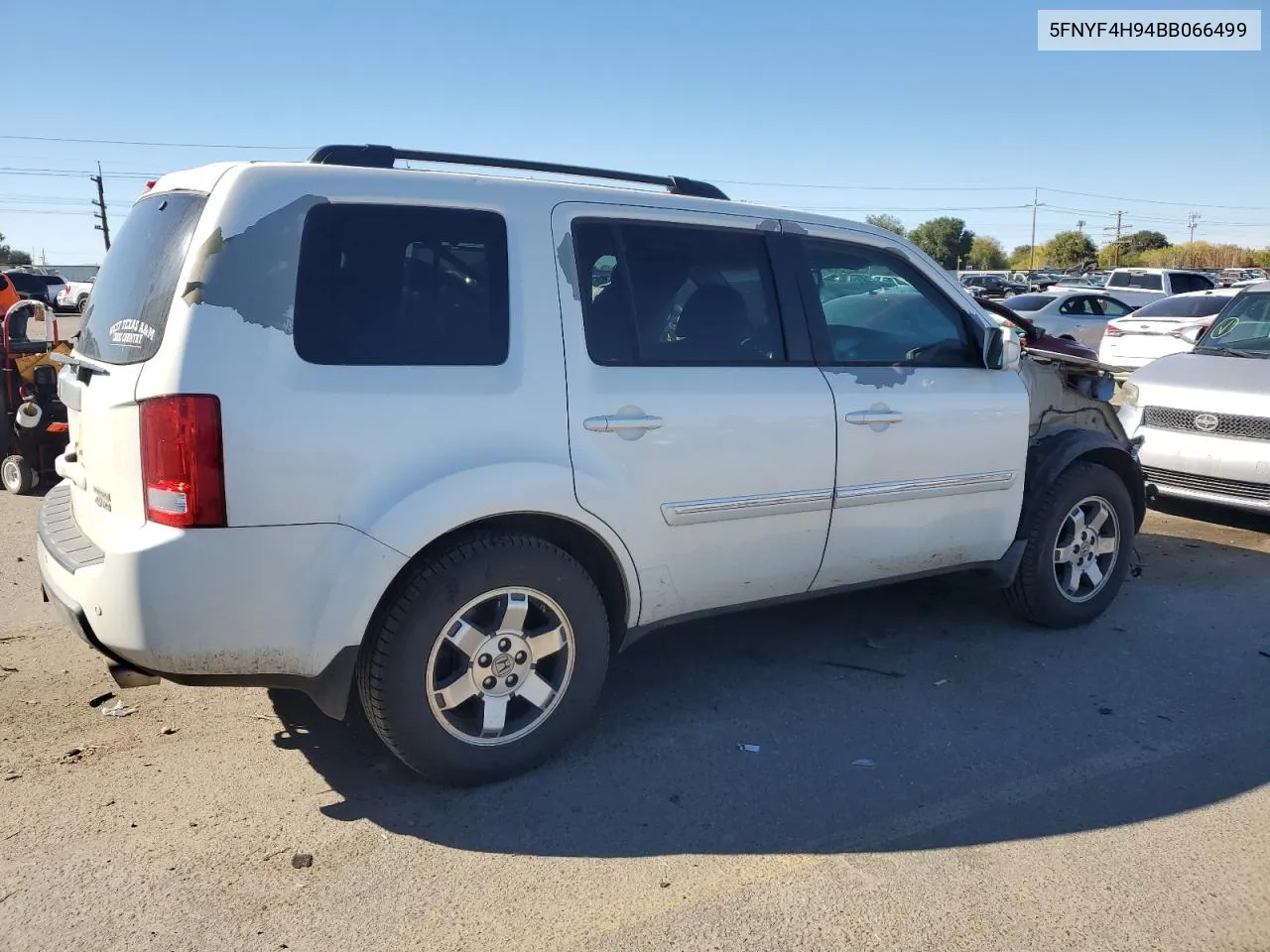 2011 Honda Pilot Touring VIN: 5FNYF4H94BB066499 Lot: 76501354