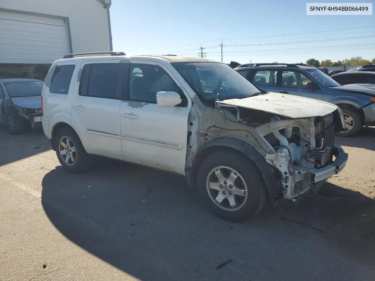 2011 Honda Pilot Touring VIN: 5FNYF4H94BB066499 Lot: 76501354