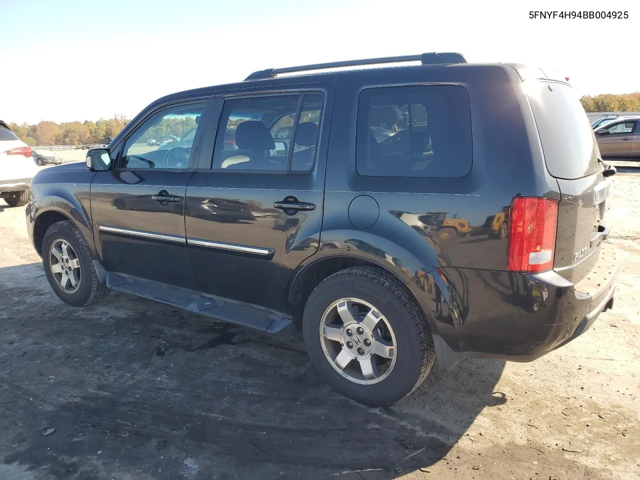 2011 Honda Pilot Touring VIN: 5FNYF4H94BB004925 Lot: 77551884