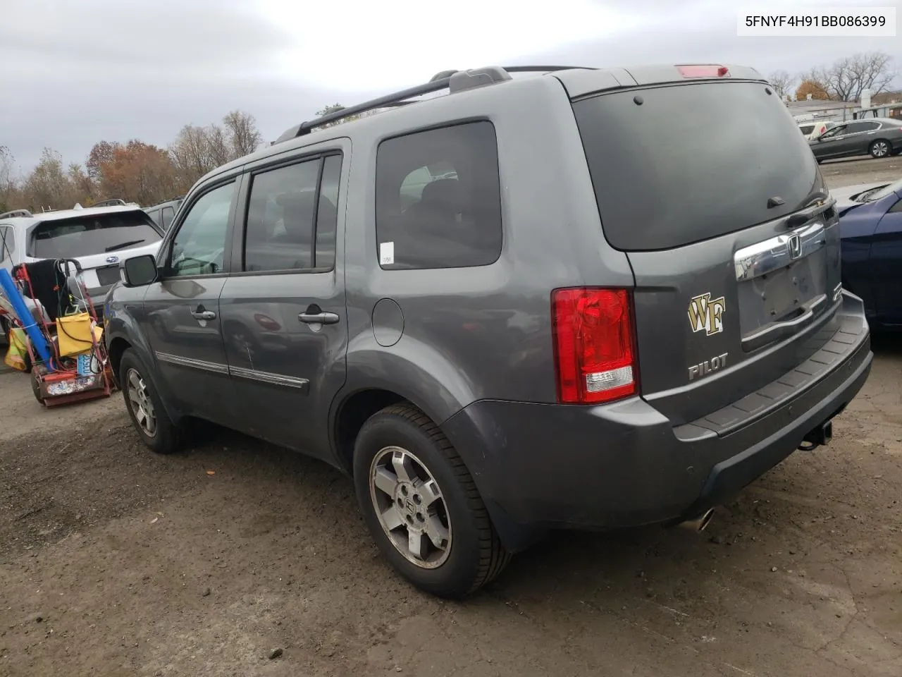 2011 Honda Pilot Touring VIN: 5FNYF4H91BB086399 Lot: 77614334