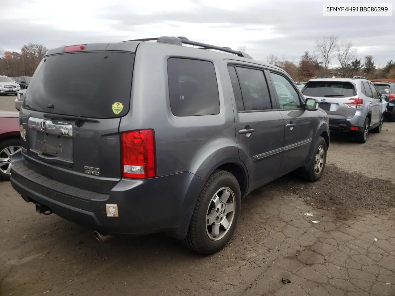 2011 Honda Pilot Touring VIN: 5FNYF4H91BB086399 Lot: 77614334