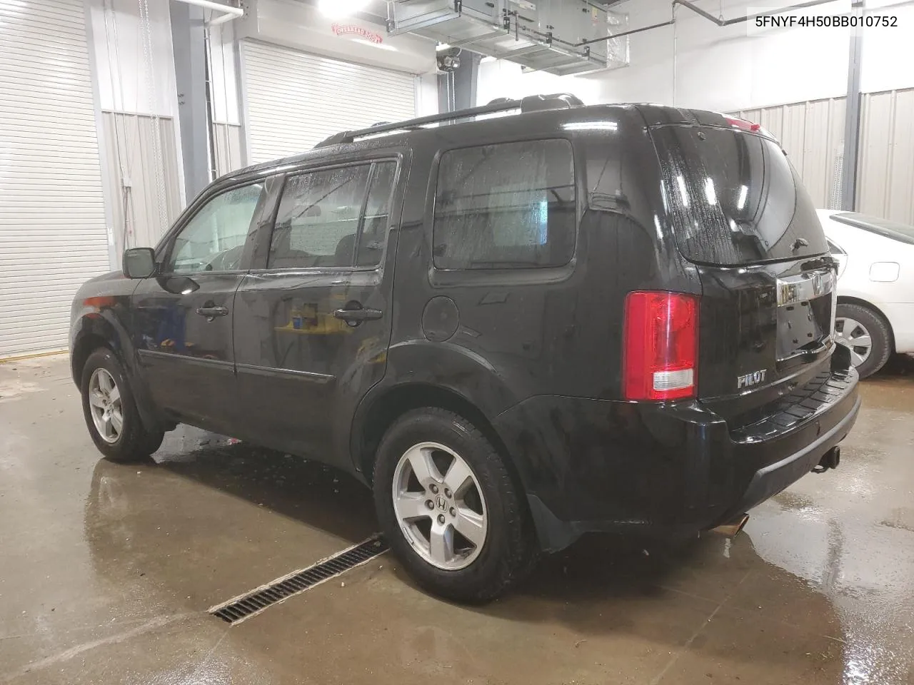 2011 Honda Pilot Exl VIN: 5FNYF4H50BB010752 Lot: 77806464