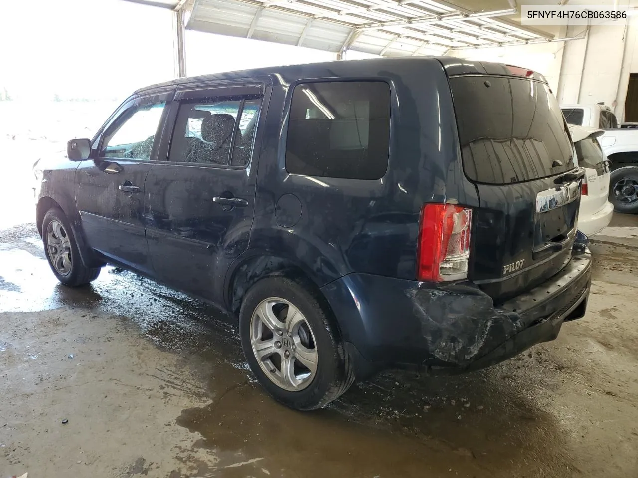 2012 Honda Pilot Exln VIN: 5FNYF4H76CB063586 Lot: 57051594