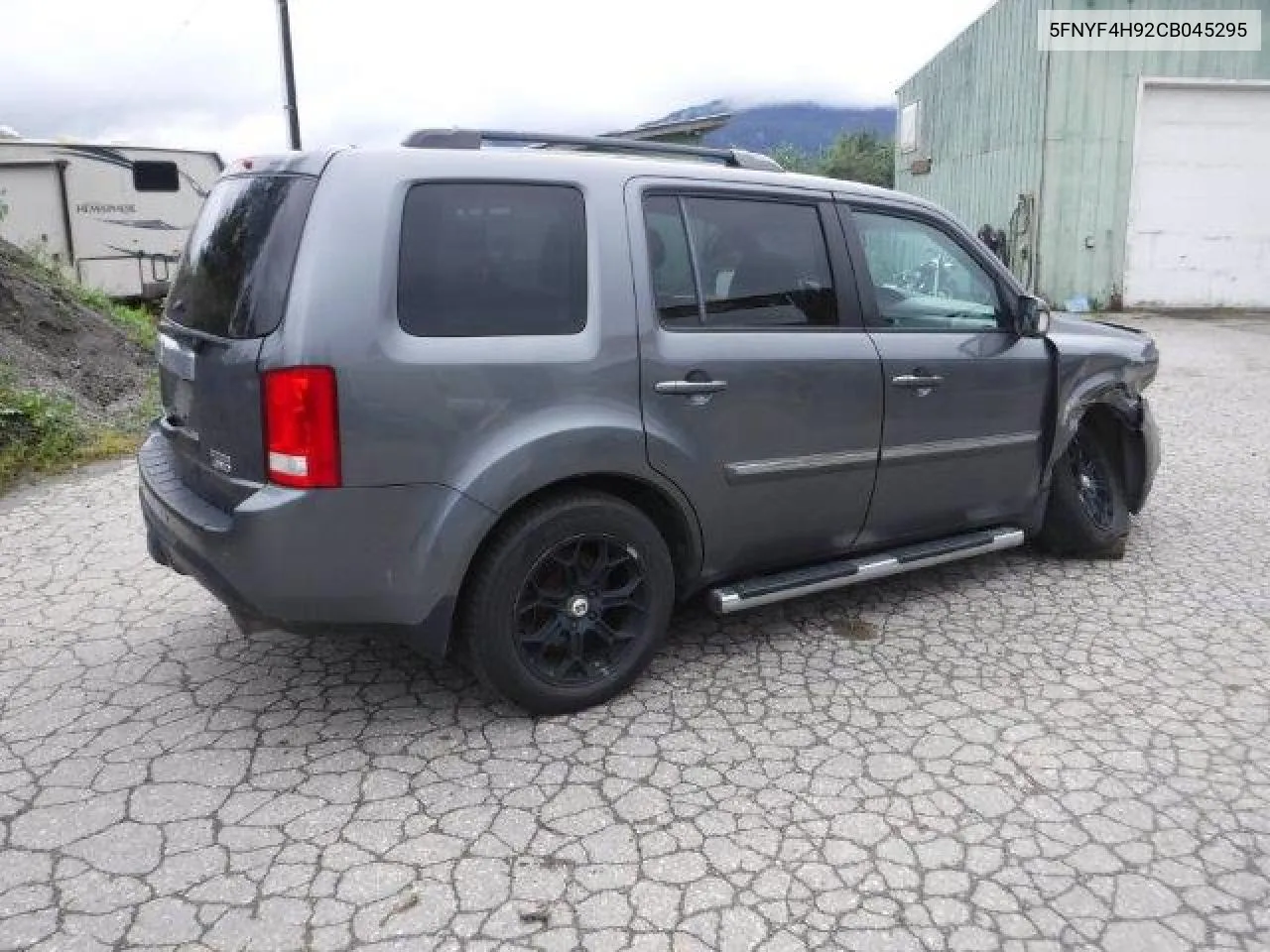 2012 Honda Pilot Touring VIN: 5FNYF4H92CB045295 Lot: 69709334