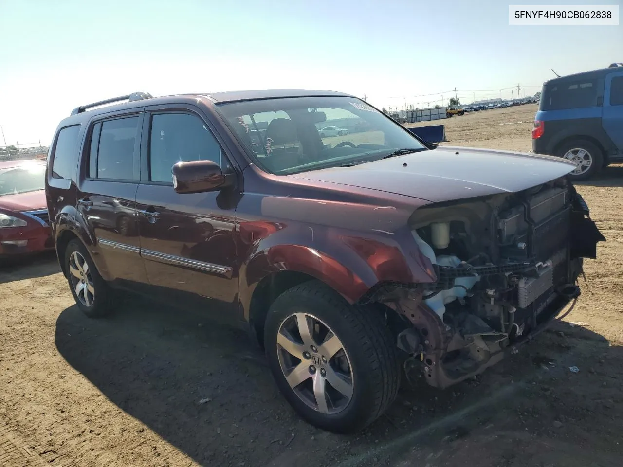 2012 Honda Pilot Touring VIN: 5FNYF4H90CB062838 Lot: 70239054