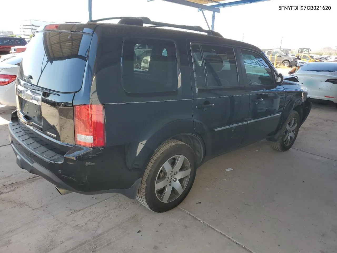 2012 Honda Pilot Touring VIN: 5FNYF3H97CB021620 Lot: 70667414