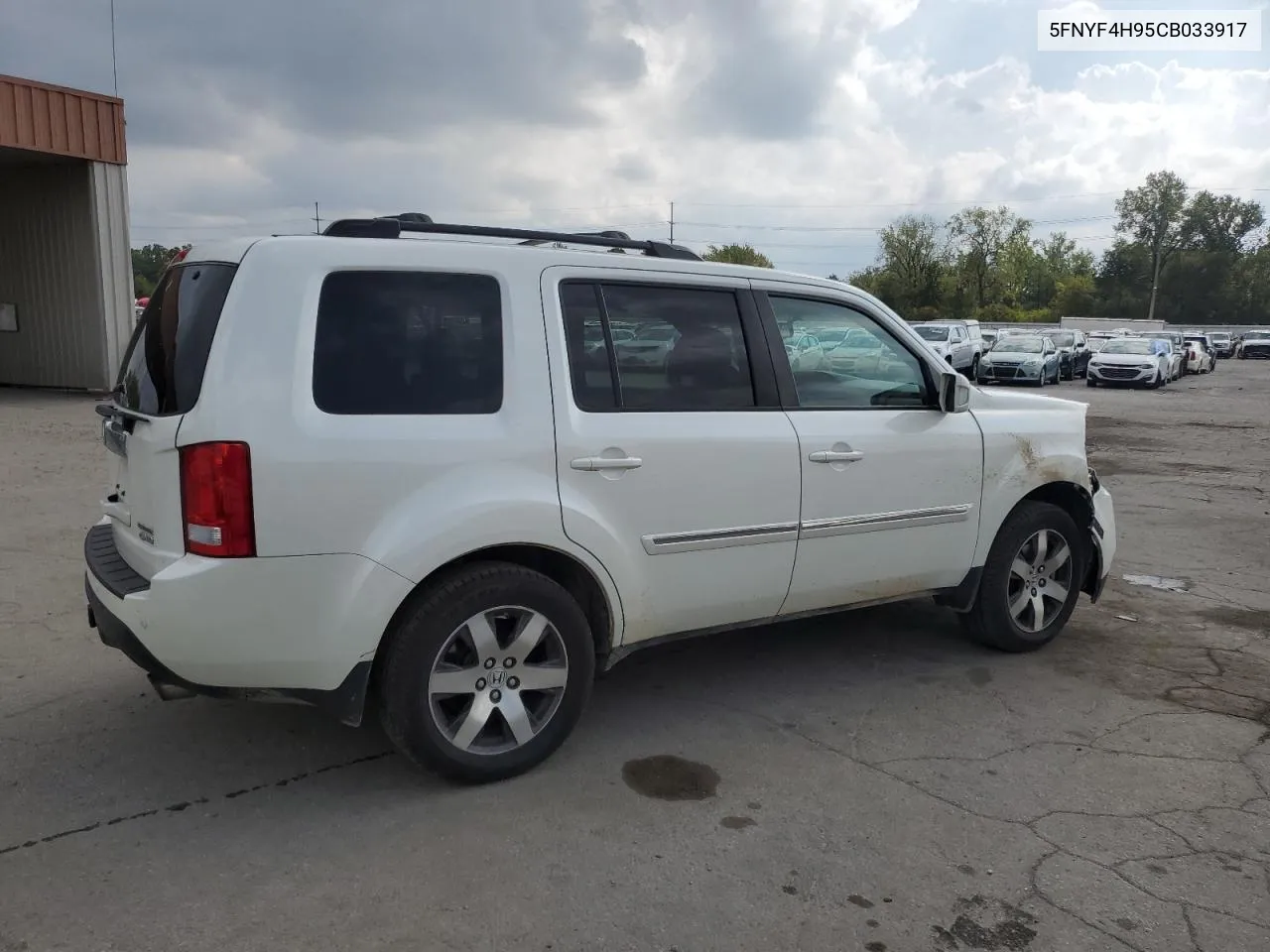 2012 Honda Pilot Touring VIN: 5FNYF4H95CB033917 Lot: 74113634