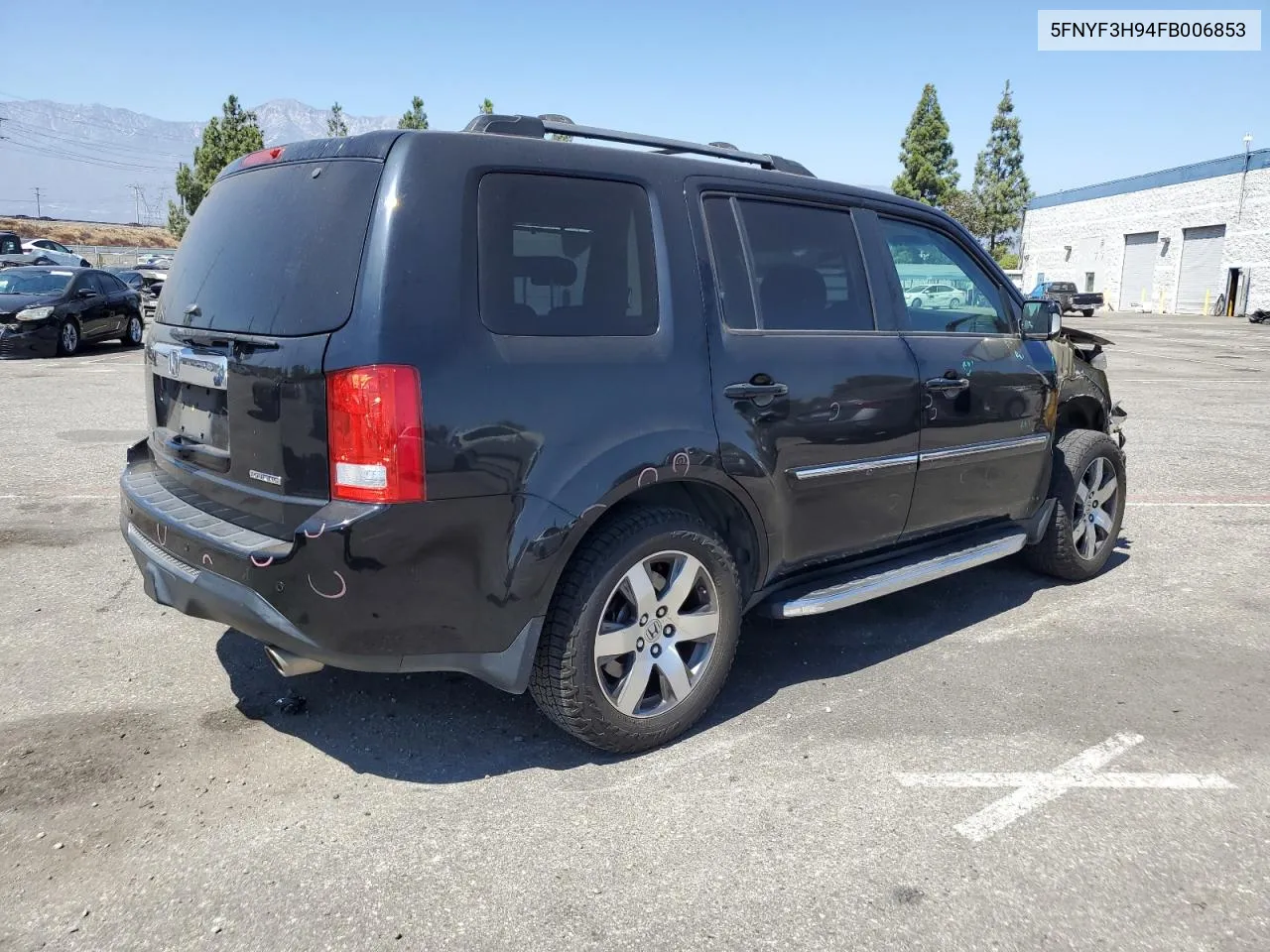 2015 Honda Pilot Touring VIN: 5FNYF3H94FB006853 Lot: 69703554