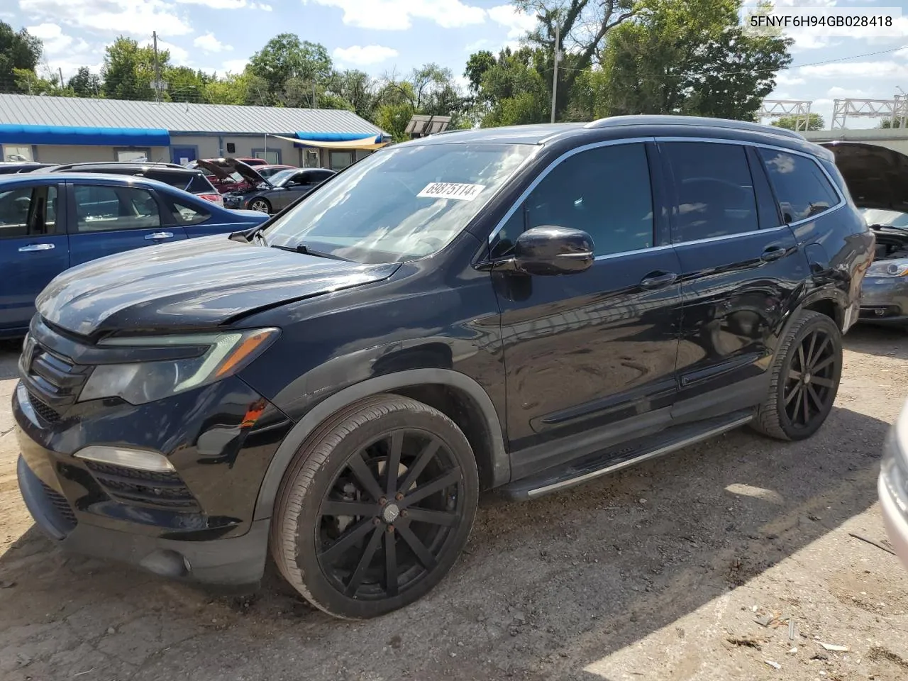 2016 Honda Pilot Touring VIN: 5FNYF6H94GB028418 Lot: 69875114