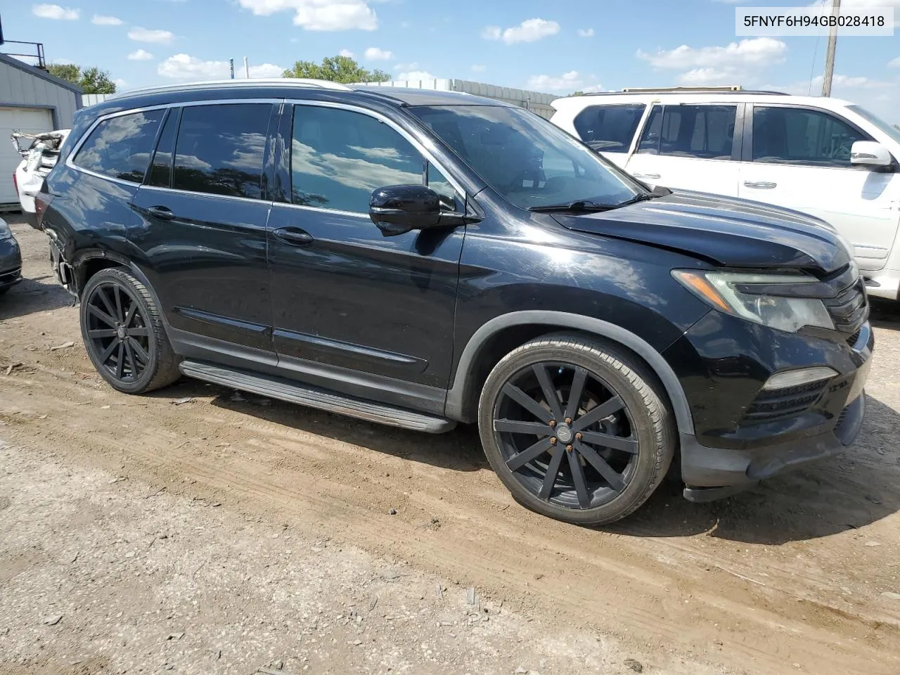 2016 Honda Pilot Touring VIN: 5FNYF6H94GB028418 Lot: 69875114