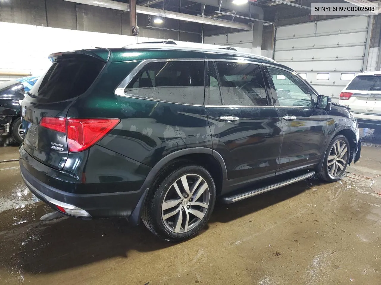 2016 Honda Pilot Touring VIN: 5FNYF6H97GB002508 Lot: 70224384