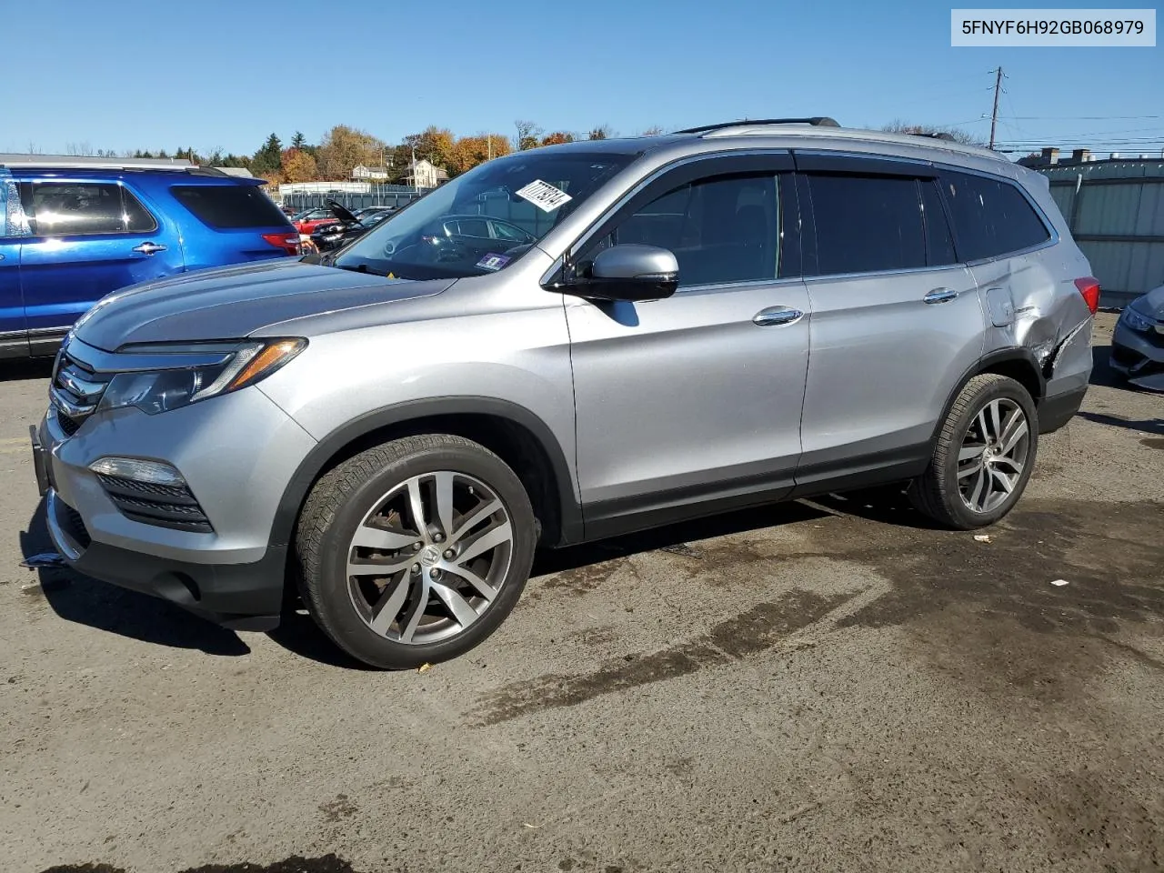 2016 Honda Pilot Touring VIN: 5FNYF6H92GB068979 Lot: 77779314