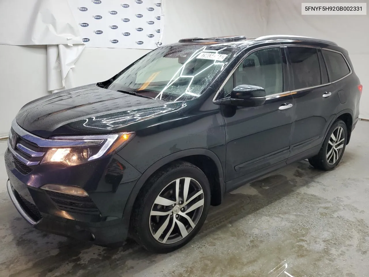 2016 Honda Pilot Touring VIN: 5FNYF5H92GB002331 Lot: 79034344