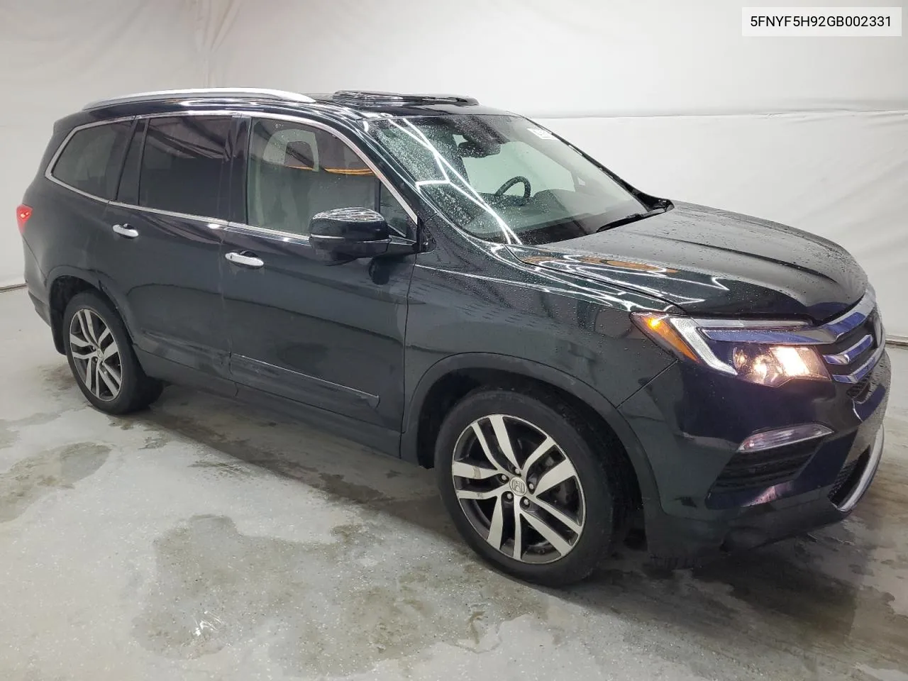 2016 Honda Pilot Touring VIN: 5FNYF5H92GB002331 Lot: 79034344