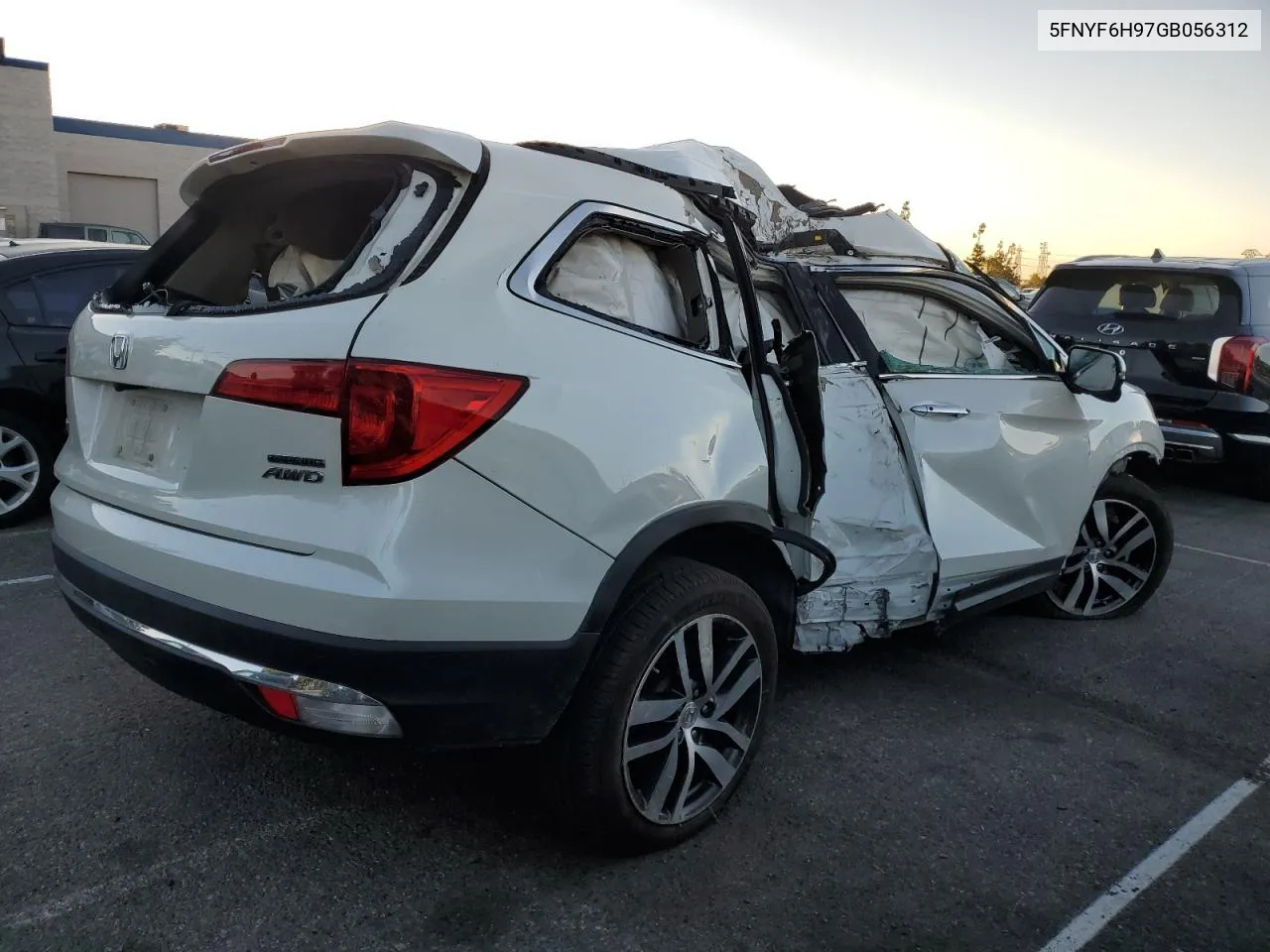 2016 Honda Pilot Touring VIN: 5FNYF6H97GB056312 Lot: 79748234