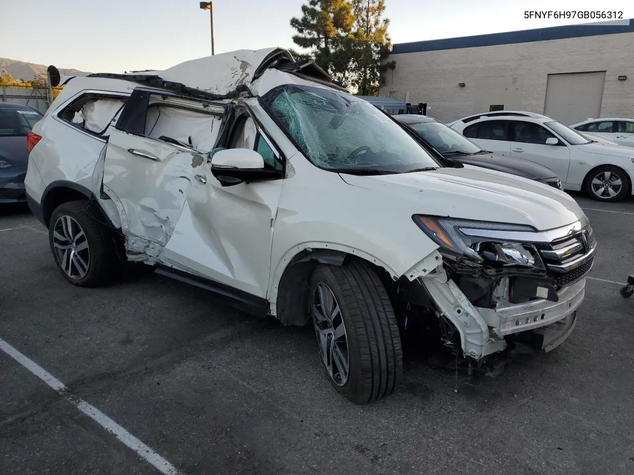 2016 Honda Pilot Touring VIN: 5FNYF6H97GB056312 Lot: 79748234