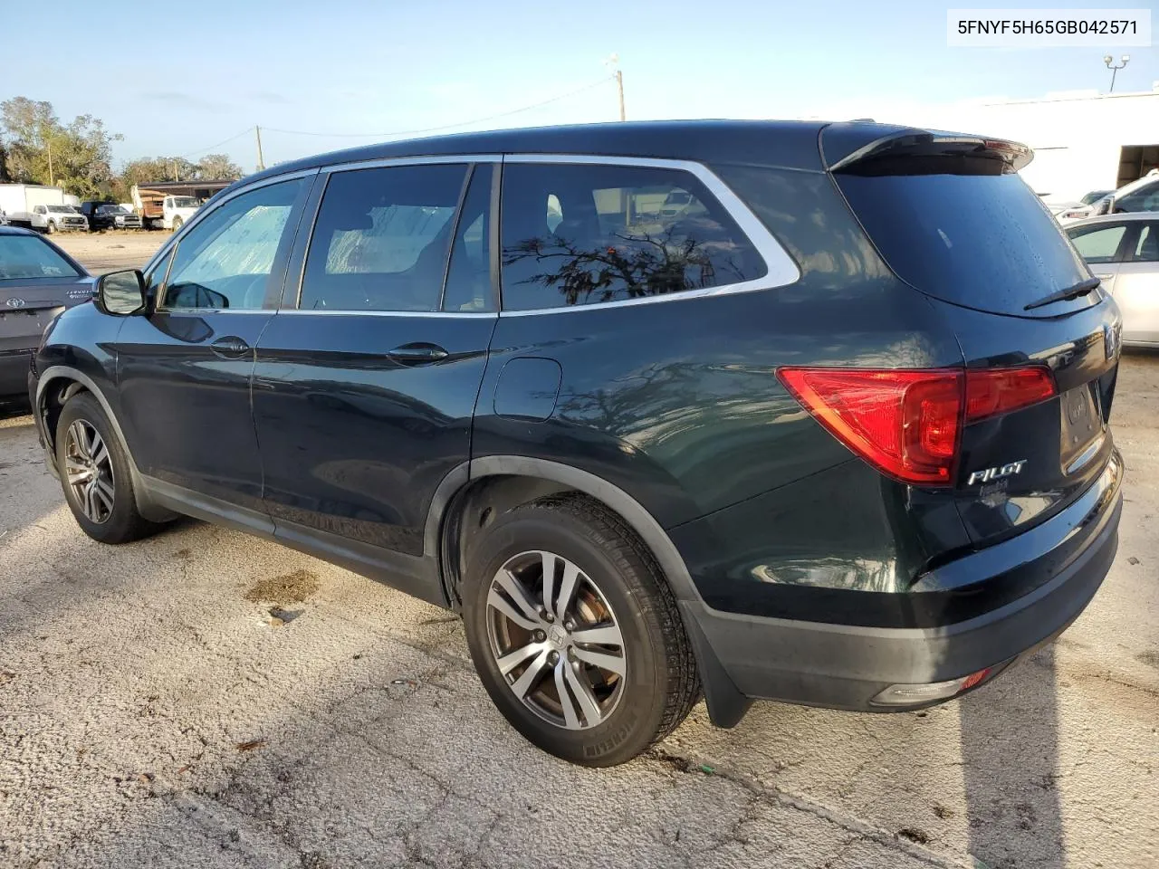 2016 Honda Pilot Exl VIN: 5FNYF5H65GB042571 Lot: 80233734