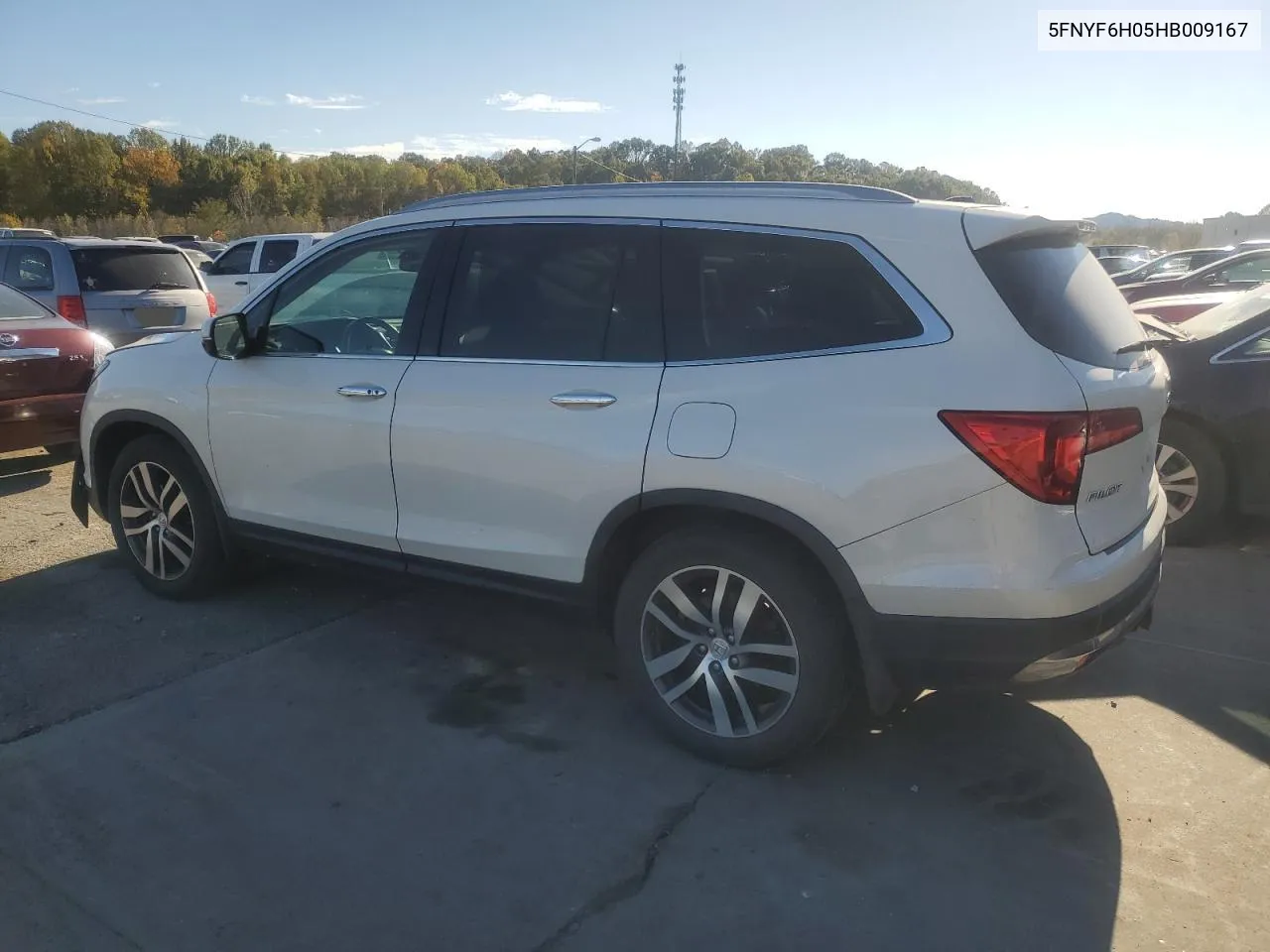 2017 Honda Pilot Elite VIN: 5FNYF6H05HB009167 Lot: 77129094