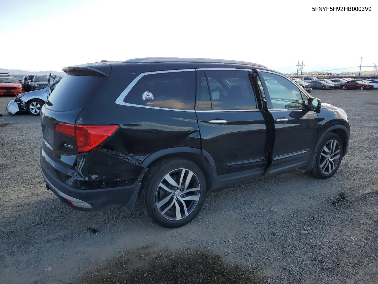 2017 Honda Pilot Touring VIN: 5FNYF5H92HB000399 Lot: 77606054