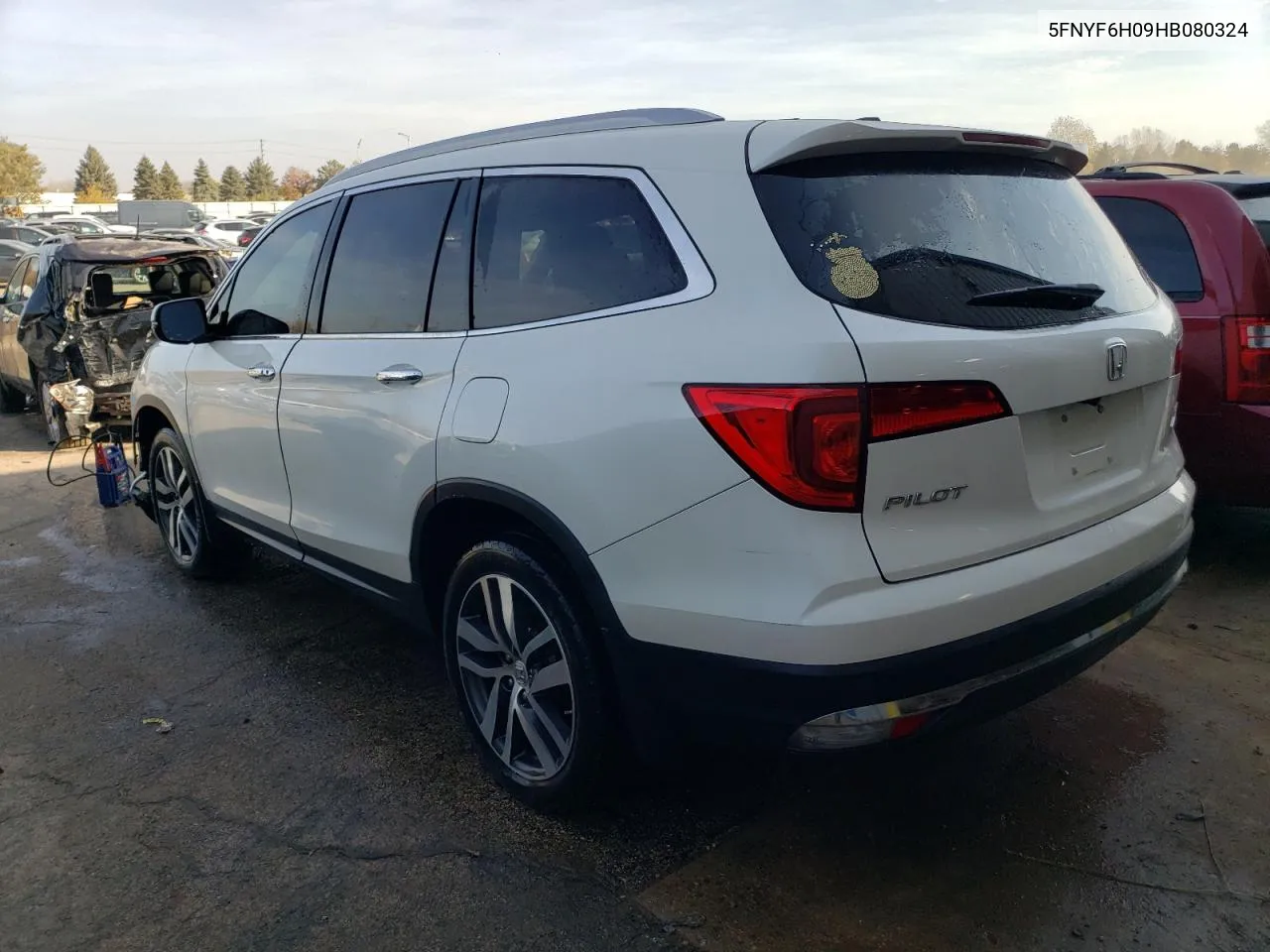 2017 Honda Pilot Elite VIN: 5FNYF6H09HB080324 Lot: 77824734