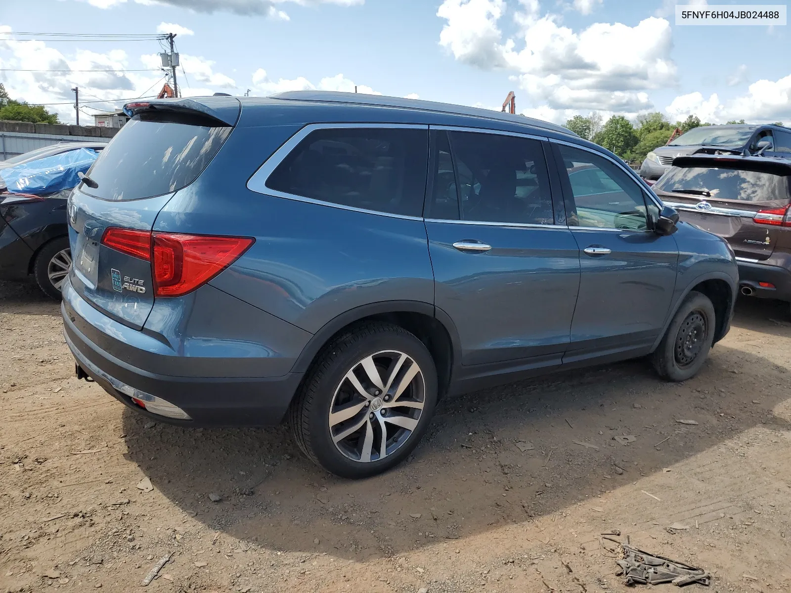 2018 Honda Pilot Elite VIN: 5FNYF6H04JB024488 Lot: 67825384