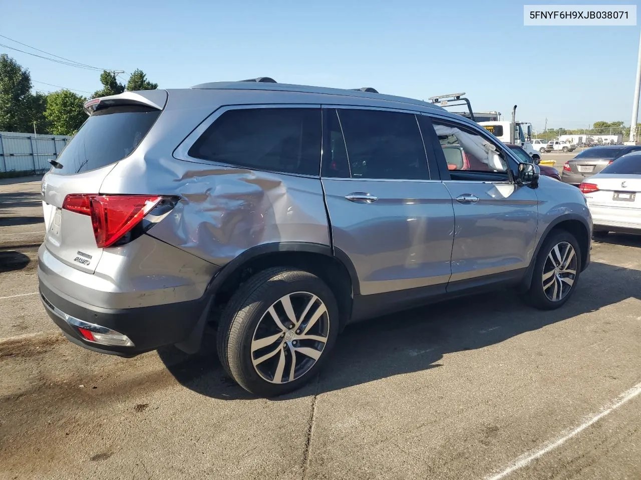 2018 Honda Pilot Touring VIN: 5FNYF6H9XJB038071 Lot: 69337514