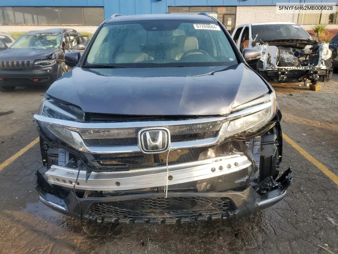 2021 Honda Pilot Touring VIN: 5FNYF6H62MB000828 Lot: 67269884