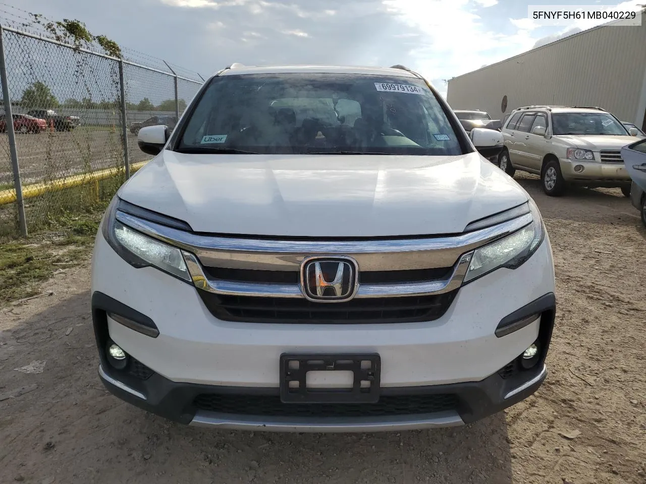 2021 Honda Pilot Touring VIN: 5FNYF5H61MB040229 Lot: 69979134