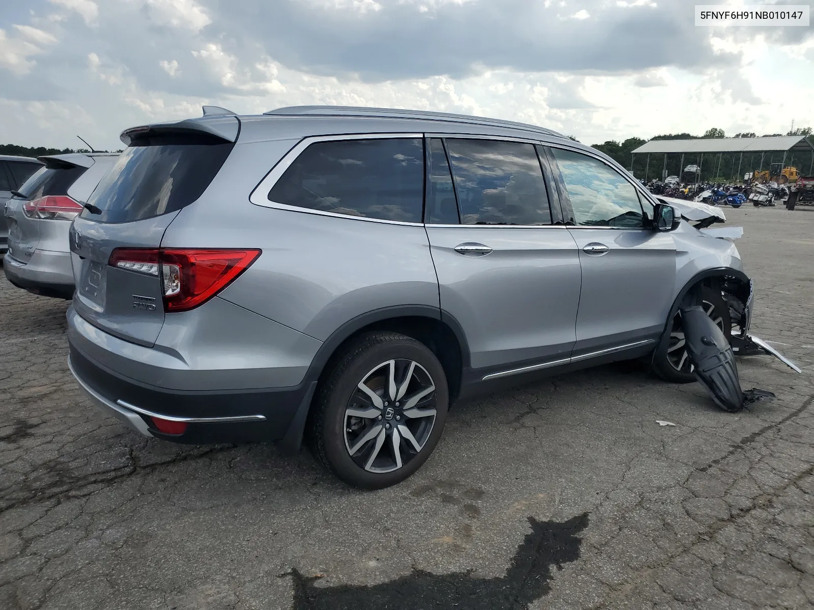 2022 Honda Pilot Touring VIN: 5FNYF6H91NB010147 Lot: 65619094