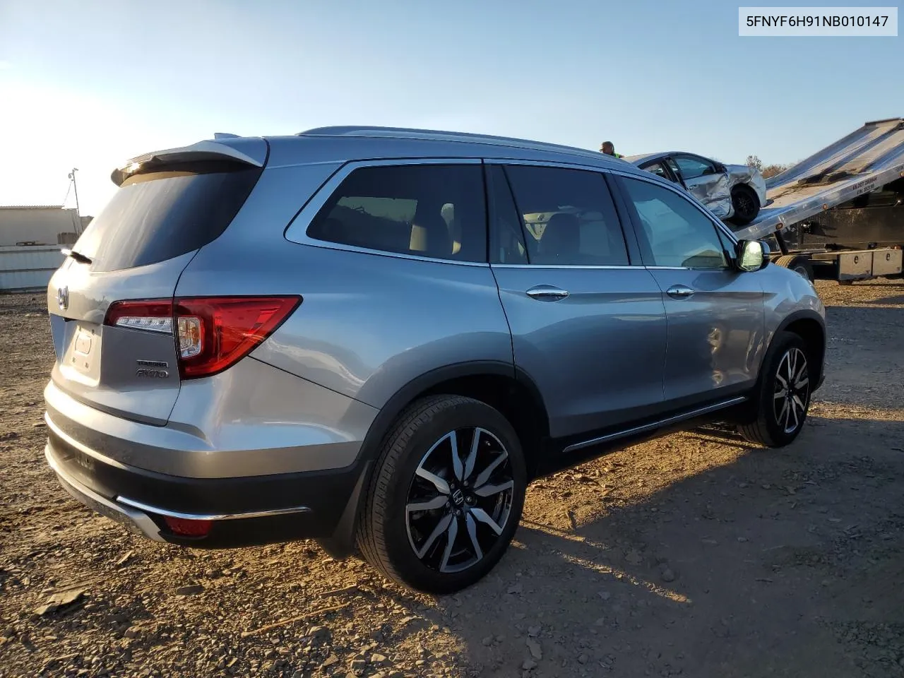 2022 Honda Pilot Touring VIN: 5FNYF6H91NB010147 Lot: 80011494