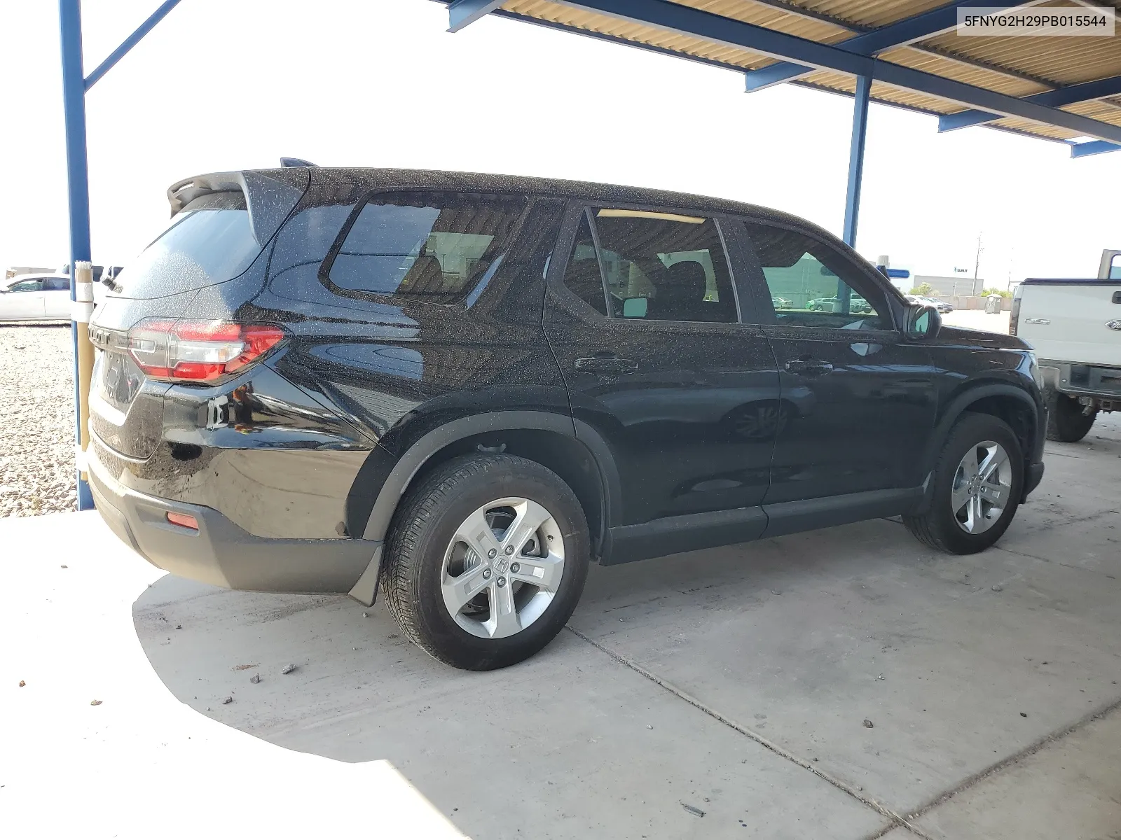 2023 Honda Pilot Lx VIN: 5FNYG2H29PB015544 Lot: 63485214