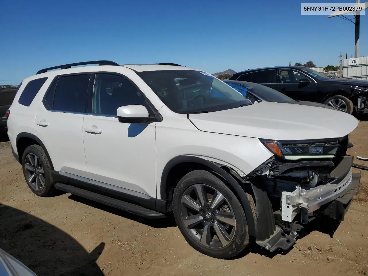 2023 Honda Pilot Touring VIN: 5FNYG1H72PB002379 Lot: 70869114