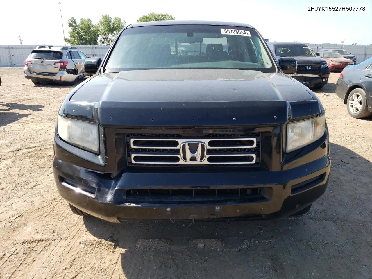 2007 Honda Ridgeline Rtl VIN: 2HJYK16527H507778 Lot: 68738654