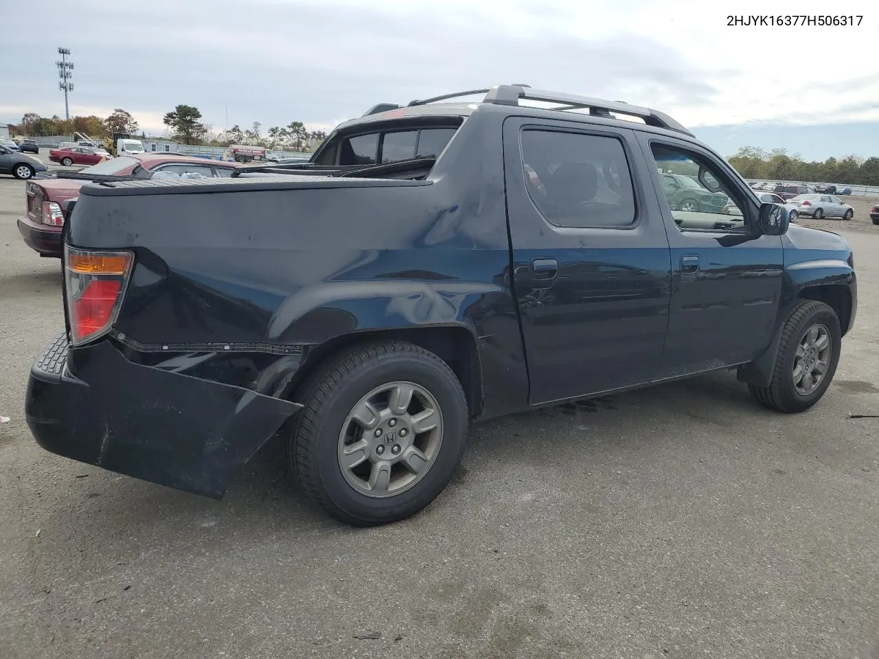 2007 Honda Ridgeline Rtx VIN: 2HJYK16377H506317 Lot: 74765834