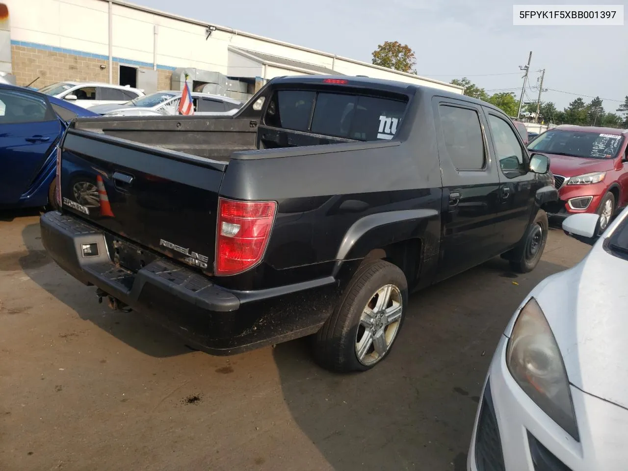 2011 Honda Ridgeline Rtl VIN: 5FPYK1F5XBB001397 Lot: 66907824