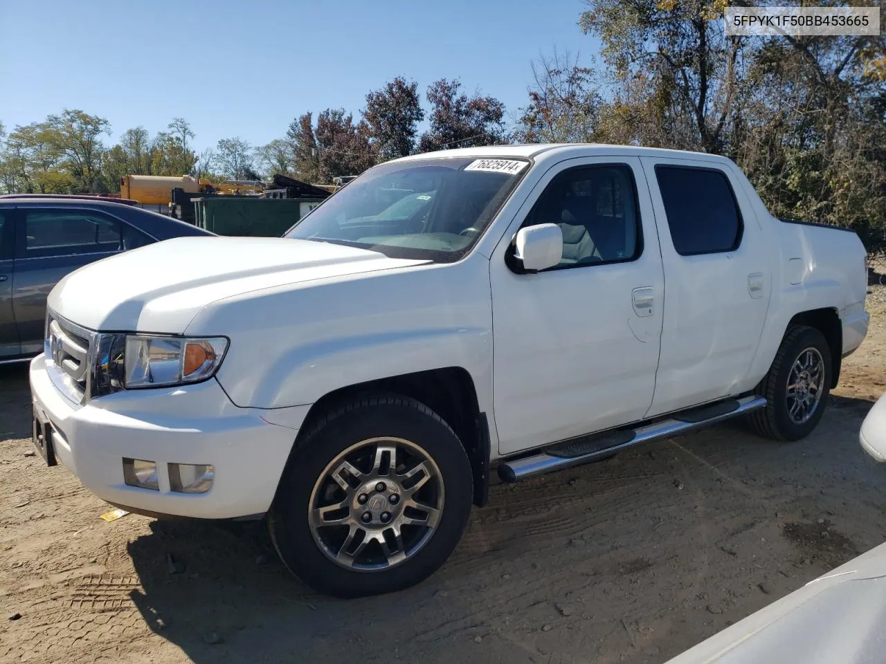 2011 Honda Ridgeline Rtl VIN: 5FPYK1F50BB453665 Lot: 76825914