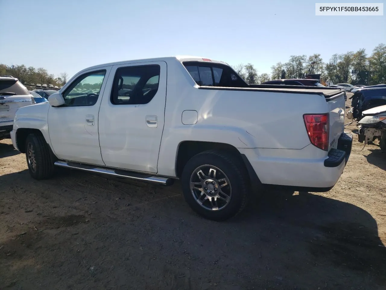 2011 Honda Ridgeline Rtl VIN: 5FPYK1F50BB453665 Lot: 76825914